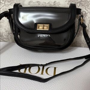 Prada Beauty Wristlet in Clear Bag